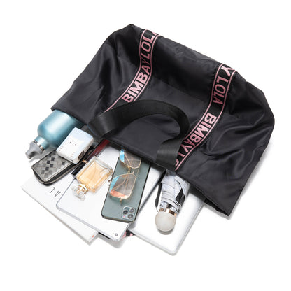 A versatile everyday tote bag designed for style and function. Made from durable lightweight nylon with bold logo shoulder straps, it’s perfect for work, travel, shopping, and daily use.