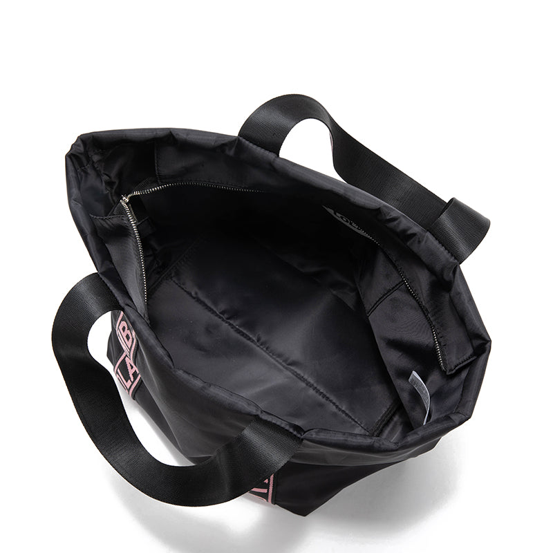 A versatile everyday tote bag designed for style and function. Made from durable lightweight nylon with bold logo shoulder straps, it’s perfect for work, travel, shopping, and daily use.
