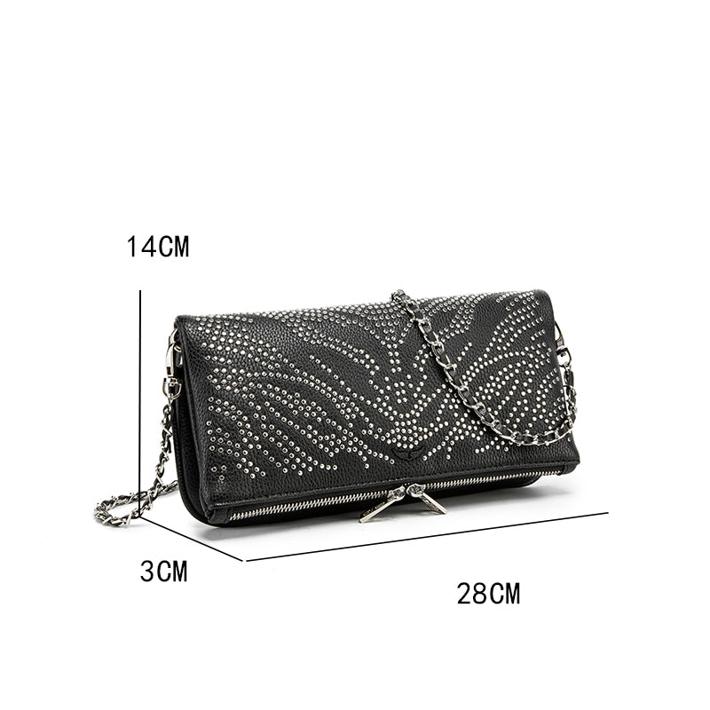 Turn heads wherever you go with this dazzling rhinestone-studded crossbody bag. Designed with a striking symmetrical crystal pattern on premium black textured leather, this piece brings together elegance, glamour, and a bold fashion edge.