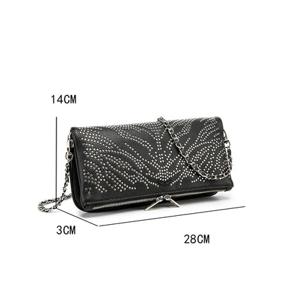 Turn heads wherever you go with this dazzling rhinestone-studded crossbody bag. Designed with a striking symmetrical crystal pattern on premium black textured leather, this piece brings together elegance, glamour, and a bold fashion edge.