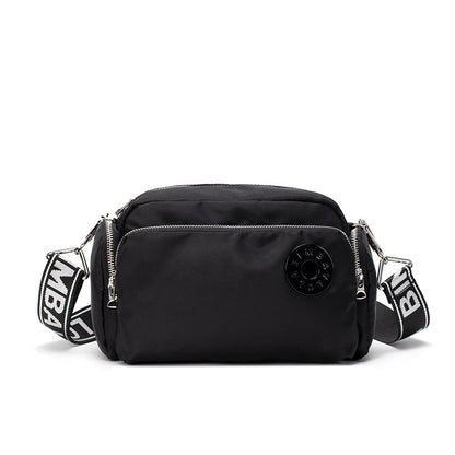 A sleek and lightweight crossbody bag designed for everyday use. Crafted from durable nylon with a soft-touch finish, it combines practicality and minimalist style—perfect for travel, errands, or casual outings
