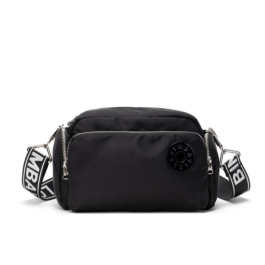 A sleek and lightweight crossbody bag designed for everyday use. Crafted from durable nylon with a soft-touch finish, it combines practicality and minimalist style—perfect for travel, errands, or casual outings