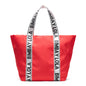 A versatile everyday tote bag designed for style and function. Made from durable lightweight nylon with bold logo shoulder straps, it’s perfect for work, travel, shopping, and daily use.