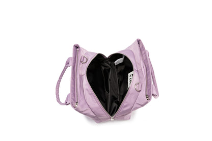 A stylish and structured mini tote designed for everyday elegance. Crafted from durable lightweight nylon in a soft lavender tone, it features dual top handles and a bold adjustable logo strap for versatile carry options