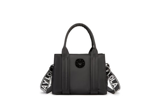 A stylish and structured mini tote designed for everyday elegance. Crafted from durable lightweight nylon in a soft lavender tone, it features dual top handles and a bold adjustable logo strap for versatile carry options