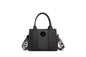 A stylish and structured mini tote designed for everyday elegance. Crafted from durable lightweight nylon in a soft lavender tone, it features dual top handles and a bold adjustable logo strap for versatile carry options