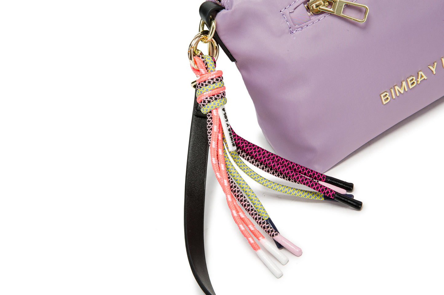 A stylish compact crossbody bag designed for everyday elegance. Featuring a lightweight nylon body in soft purple with gold-tone accents and a playful tassel strap, it’s perfect for daily outings, travel, and casual chic look