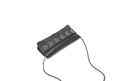 Make a bold statement with this edgy yet elegant studded crossbody bag. Designed for modern fashion lovers, this piece combines textured leather with sparkling metal studs, creating the perfect balance of luxury and street style.