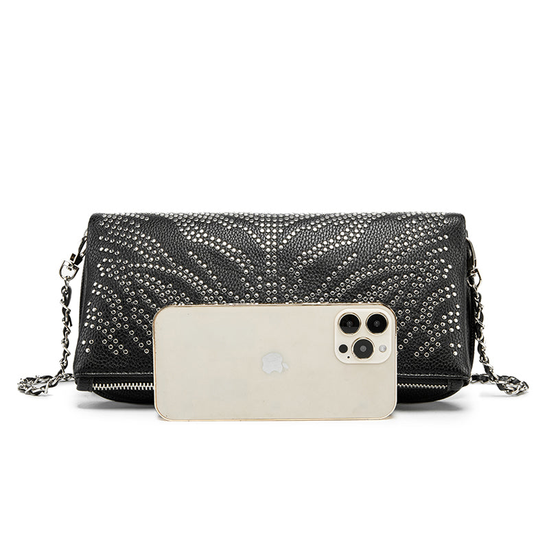 Turn heads wherever you go with this dazzling rhinestone-studded crossbody bag. Designed with a striking symmetrical crystal pattern on premium black textured leather, this piece brings together elegance, glamour, and a bold fashion edge.