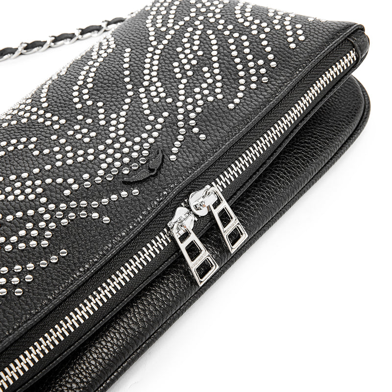 Turn heads wherever you go with this dazzling rhinestone-studded crossbody bag. Designed with a striking symmetrical crystal pattern on premium black textured leather, this piece brings together elegance, glamour, and a bold fashion edge.
