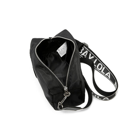 A sleek and functional crossbody bag designed for everyday convenience. Crafted from durable lightweight nylon with a modern minimalist shape, it’s perfect for daily errands, travel, and casual styling
